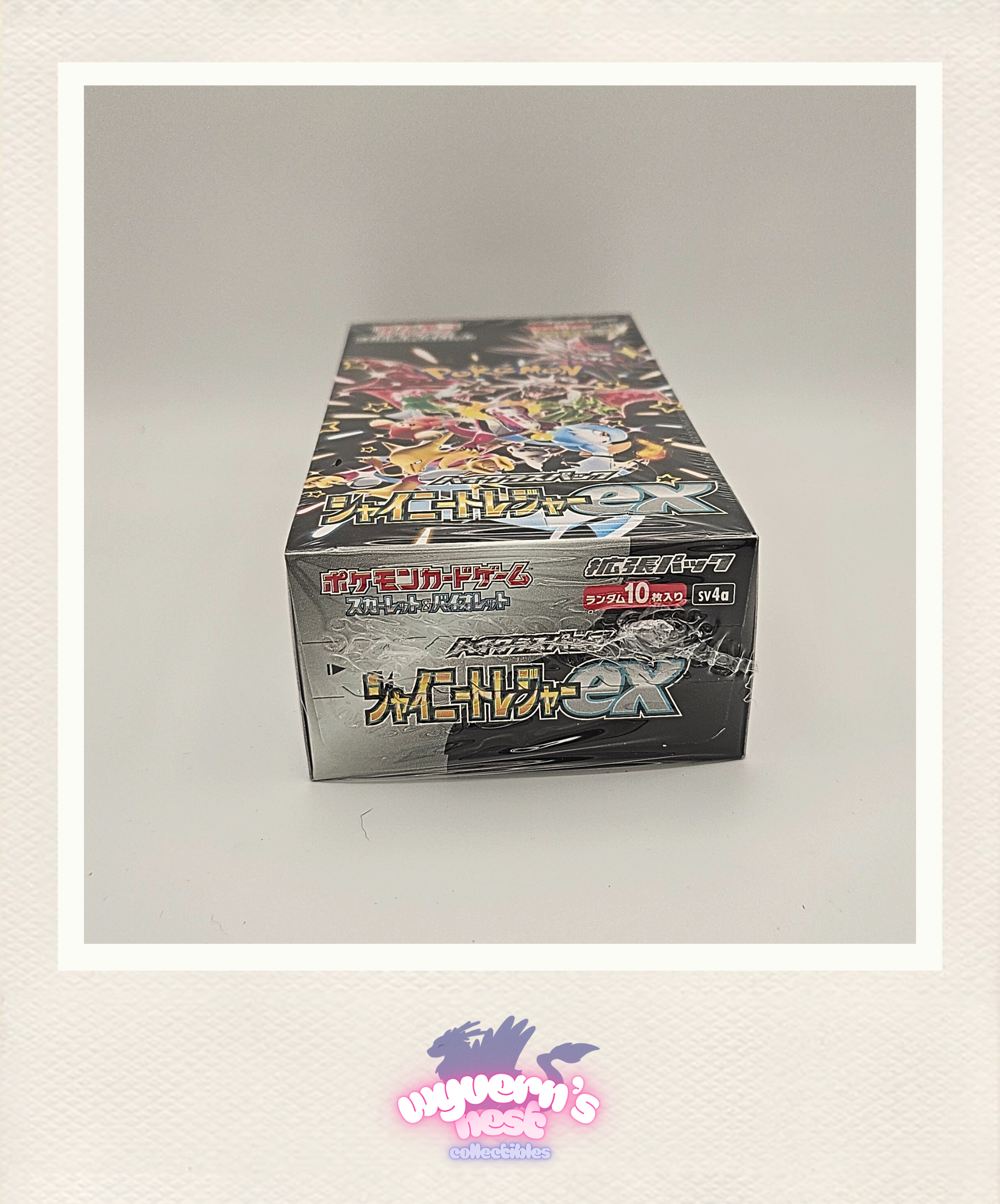 Pokémon trading card game booster pack on a light gray background