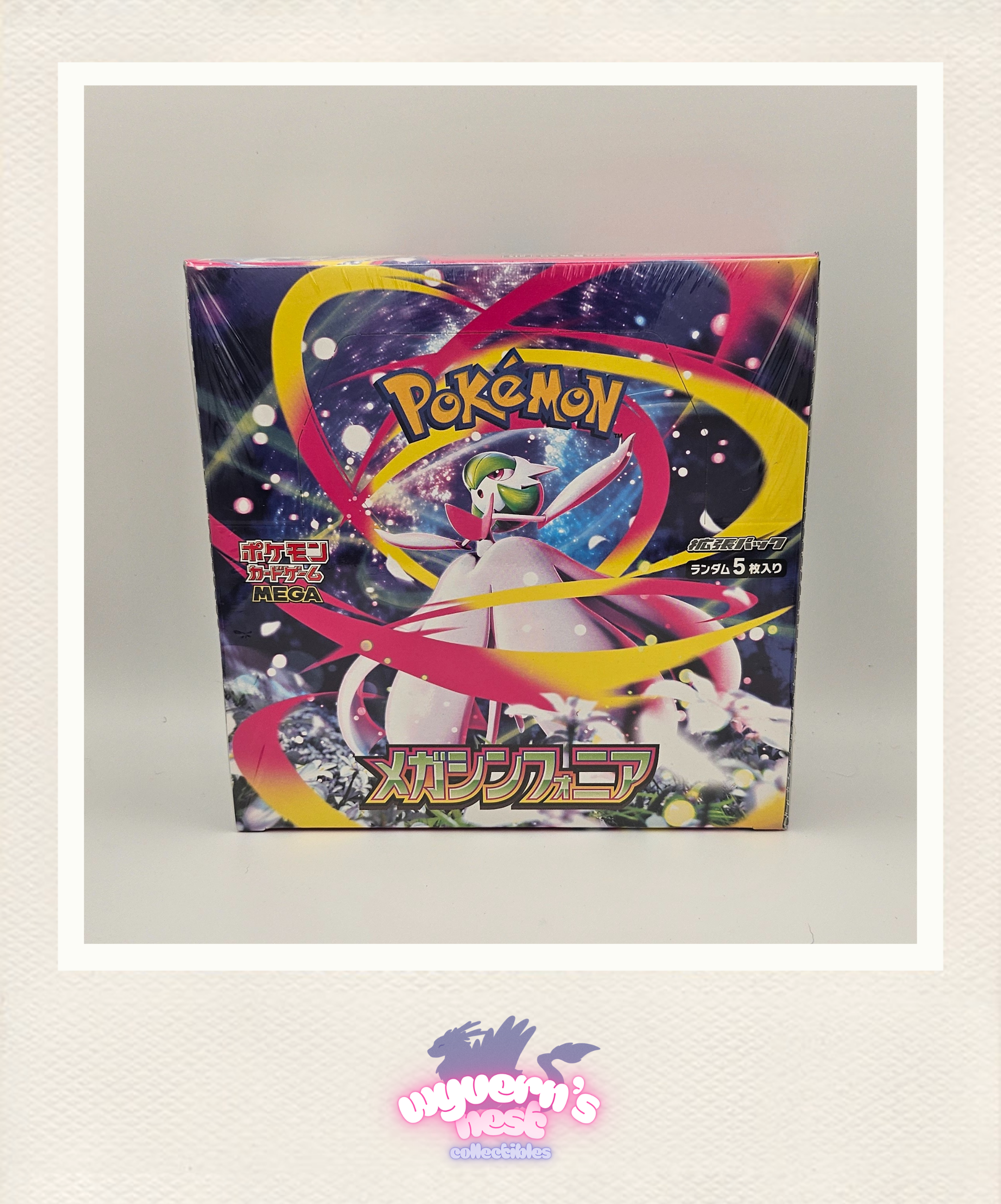 Pokémon trading card game booster box with colorful design on a light gray background