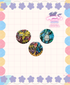 Colorful buttons with stained glass designs on a grid background with floral border