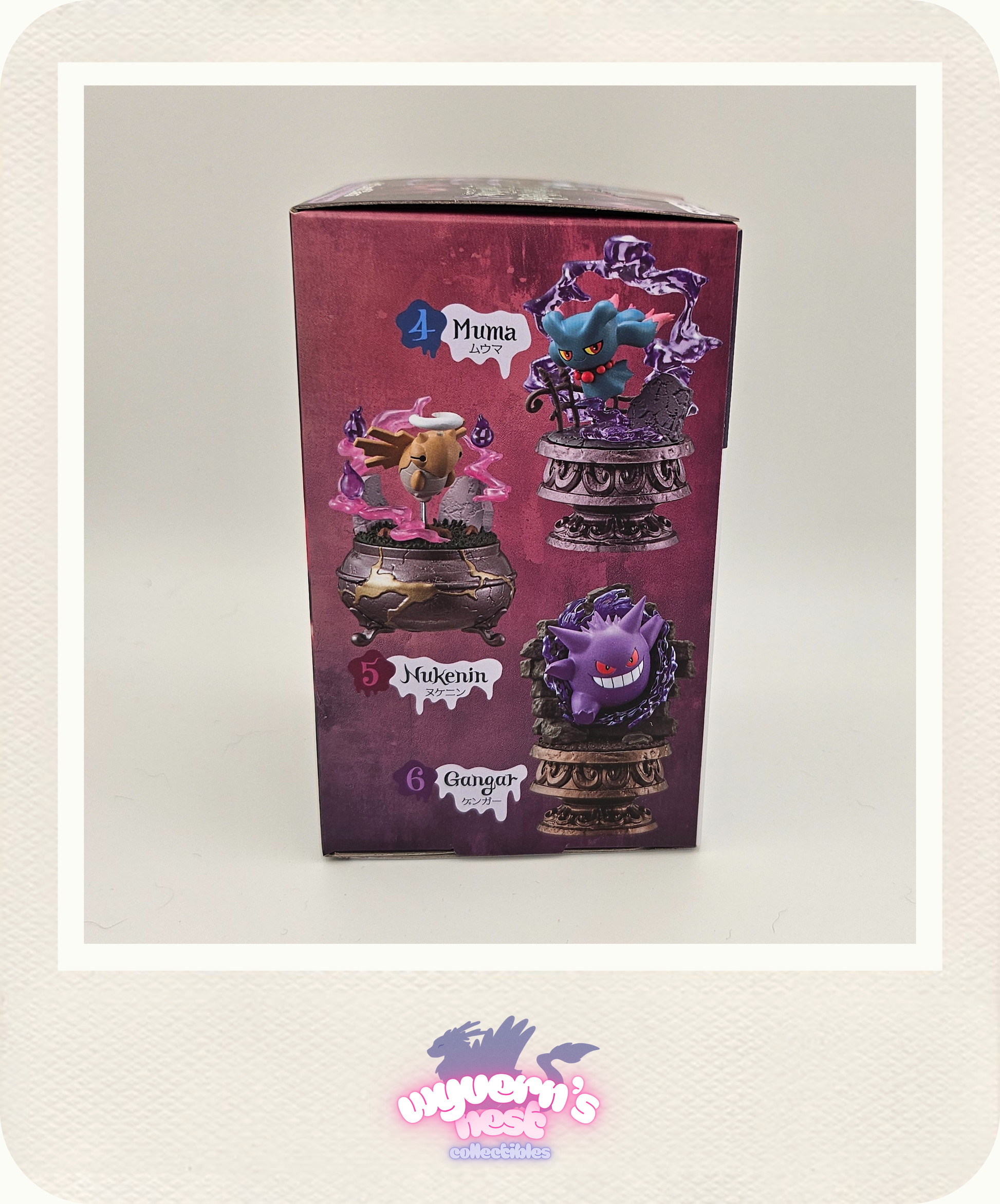 Boxed set of fantasy figurines with a visible brand logo on a white background