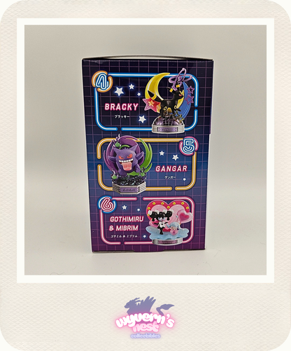 Glossy packaging with character designs and text on a light gray background